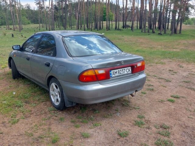 Сірий Мазда 323, об'ємом двигуна 1.5 л та пробігом 294 тис. км за 2000 $, фото 1 на Automoto.ua