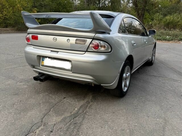 Серый Мазда 323, объемом двигателя 1.5 л и пробегом 335 тыс. км за 3300 $, фото 3 на Automoto.ua