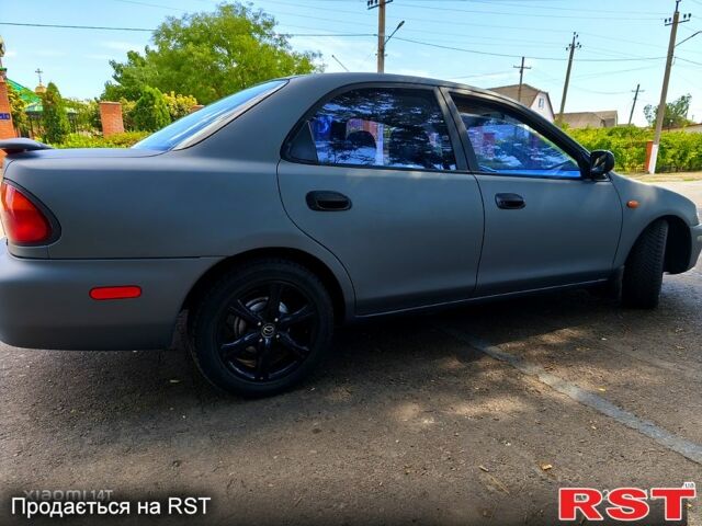 Серый Мазда 323, объемом двигателя 1.6 л и пробегом 0 тыс. км за 2650 $, фото 5 на Automoto.ua