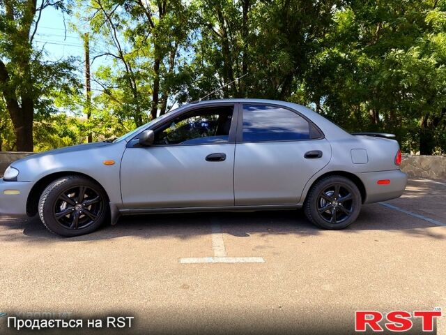 Серый Мазда 323, объемом двигателя 1.6 л и пробегом 0 тыс. км за 2650 $, фото 2 на Automoto.ua