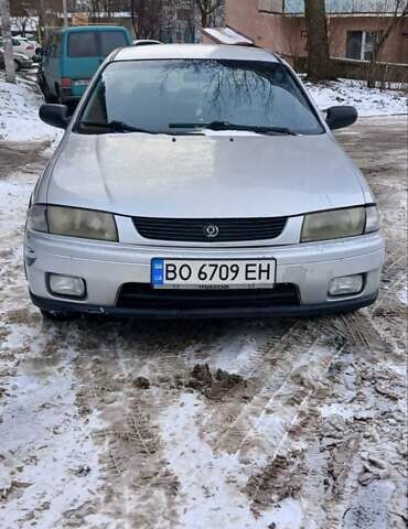 Серый Мазда 323, объемом двигателя 1.49 л и пробегом 250 тыс. км за 1900 $, фото 11 на Automoto.ua