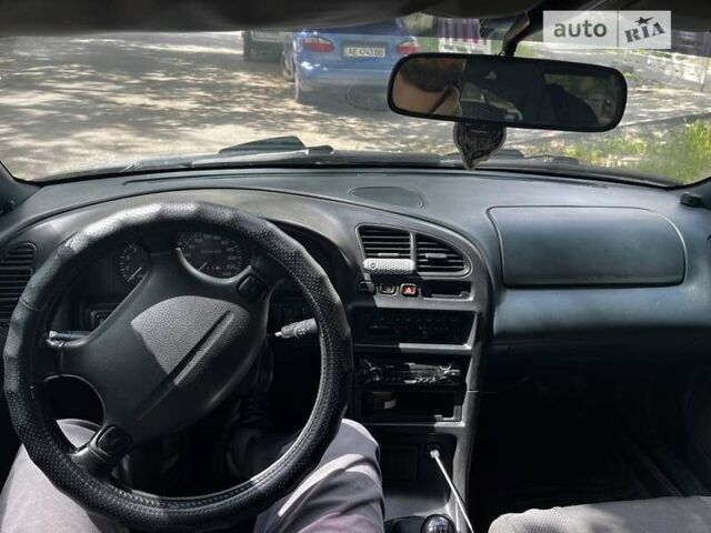 Сірий Мазда 323, об'ємом двигуна 1.5 л та пробігом 347 тис. км за 2000 $, фото 2 на Automoto.ua