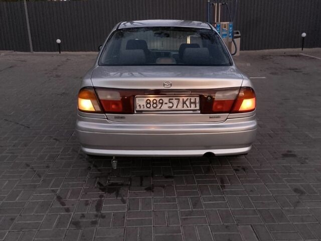 Сірий Мазда 323, об'ємом двигуна 0 л та пробігом 290 тис. км за 2100 $, фото 3 на Automoto.ua