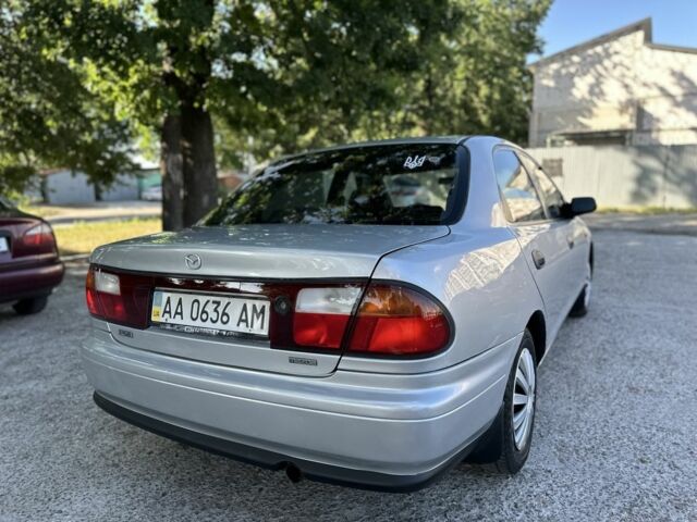 Серый Мазда 323, объемом двигателя 1.5 л и пробегом 307 тыс. км за 2650 $, фото 7 на Automoto.ua