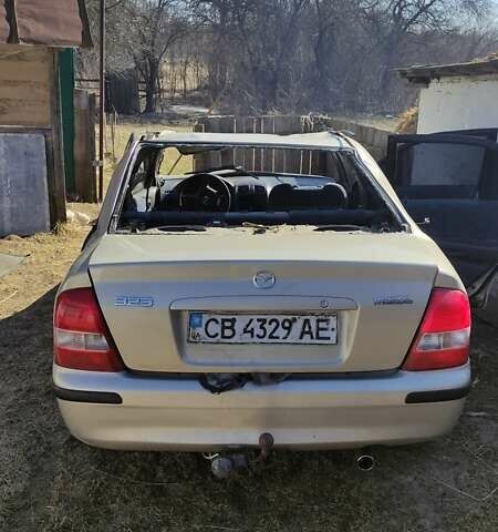 Серый Мазда 323, объемом двигателя 1.5 л и пробегом 400 тыс. км за 500 $, фото 4 на Automoto.ua