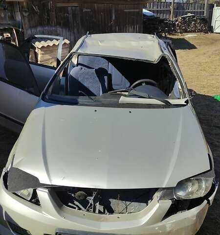 Серый Мазда 323, объемом двигателя 1.5 л и пробегом 400 тыс. км за 500 $, фото 6 на Automoto.ua