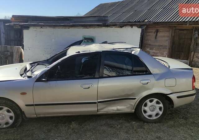 Серый Мазда 323, объемом двигателя 1.5 л и пробегом 400 тыс. км за 500 $, фото 5 на Automoto.ua