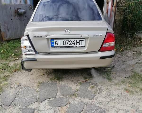 Мазда 323 1999 в Киеве на Automoto.ua Серый Мазда 323, объемом двигателя 1.8 л и пробегом 900 тыс. км за 2600 $, фото 6 на Automoto.ua