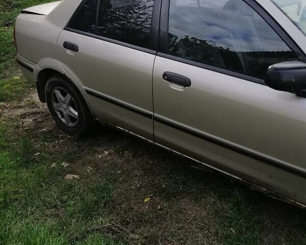 Мазда 323 1999 в Киеве на Automoto.ua Серый Мазда 323, объемом двигателя 1.8 л и пробегом 900 тыс. км за 2600 $, фото 1 на Automoto.ua