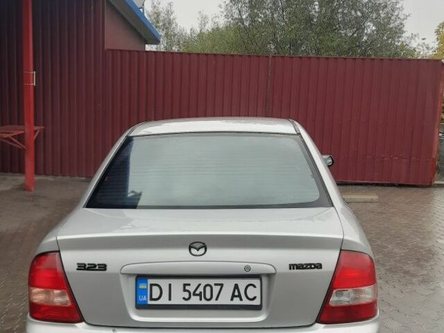 Серый Мазда 323, объемом двигателя 1.6 л и пробегом 280 тыс. км за 2200 $, фото 2 на Automoto.ua