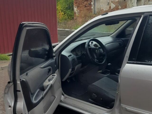 Серый Мазда 323, объемом двигателя 1.6 л и пробегом 280 тыс. км за 2200 $, фото 6 на Automoto.ua