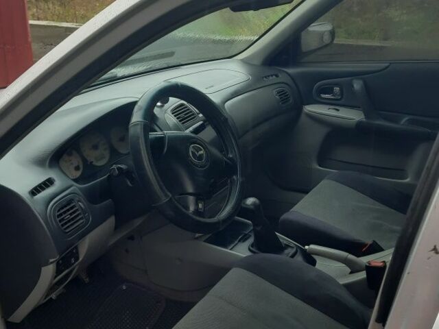 Серый Мазда 323, объемом двигателя 1.6 л и пробегом 280 тыс. км за 2200 $, фото 4 на Automoto.ua