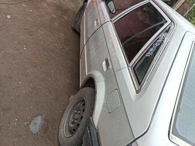 Серый Мазда 323, объемом двигателя 1.3 л и пробегом 5 тыс. км за 22 $, фото 4 на Automoto.ua