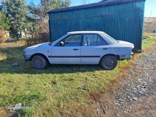 Серый Мазда 323, объемом двигателя 1.6 л и пробегом 340 тыс. км за 512 $, фото 7 на Automoto.ua