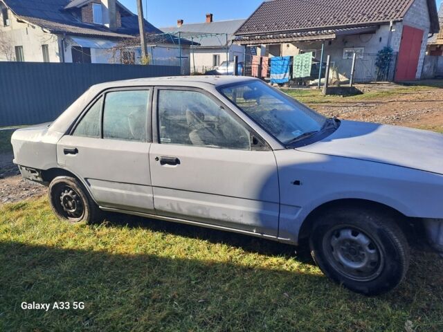 Серый Мазда 323, объемом двигателя 1.6 л и пробегом 340 тыс. км за 512 $, фото 9 на Automoto.ua