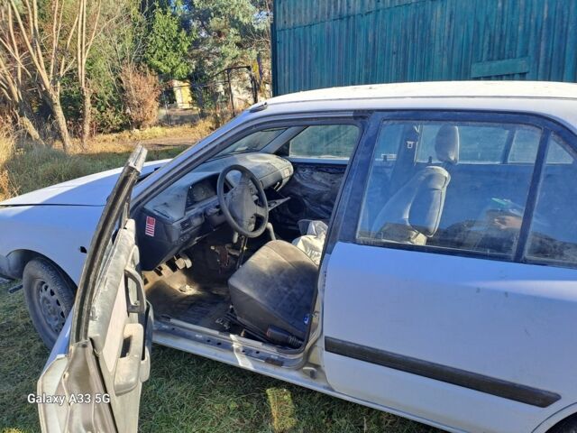 Серый Мазда 323, объемом двигателя 1.6 л и пробегом 340 тыс. км за 512 $, фото 6 на Automoto.ua