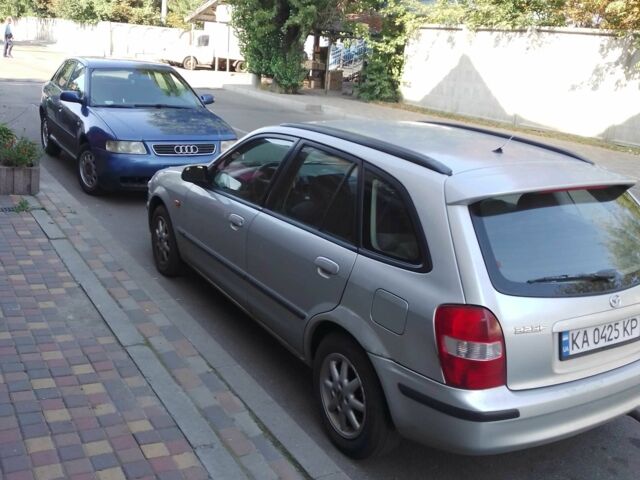 Серый Мазда 323, объемом двигателя 1.5 л и пробегом 150 тыс. км за 1300 $, фото 1 на Automoto.ua