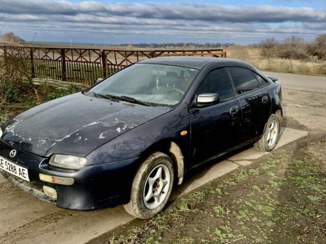 Сірий Мазда 323, об'ємом двигуна 1.5 л та пробігом 300 тис. км за 1200 $, фото 3 на Automoto.ua