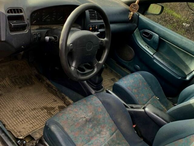 Сірий Мазда 323, об'ємом двигуна 1.5 л та пробігом 300 тис. км за 1200 $, фото 1 на Automoto.ua