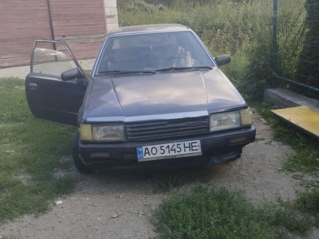 Синий Мазда 323, объемом двигателя 1.3 л и пробегом 1000 тыс. км за 449 $, фото 1 на Automoto.ua