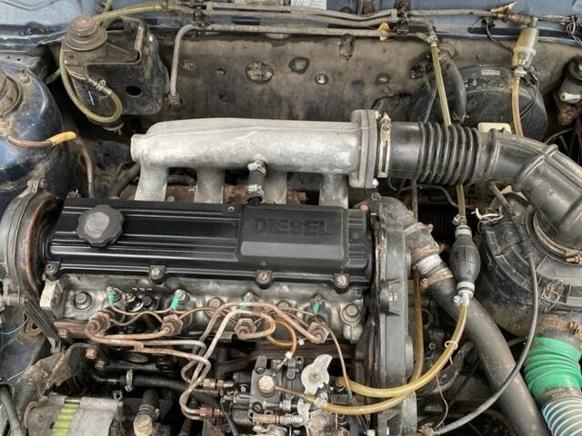 Синий Мазда 323, объемом двигателя 2 л и пробегом 465 тыс. км за 1000 $, фото 7 на Automoto.ua