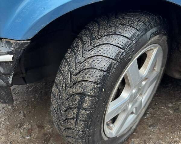 Синий Мазда 323, объемом двигателя 1.32 л и пробегом 220 тыс. км за 950 $, фото 15 на Automoto.ua