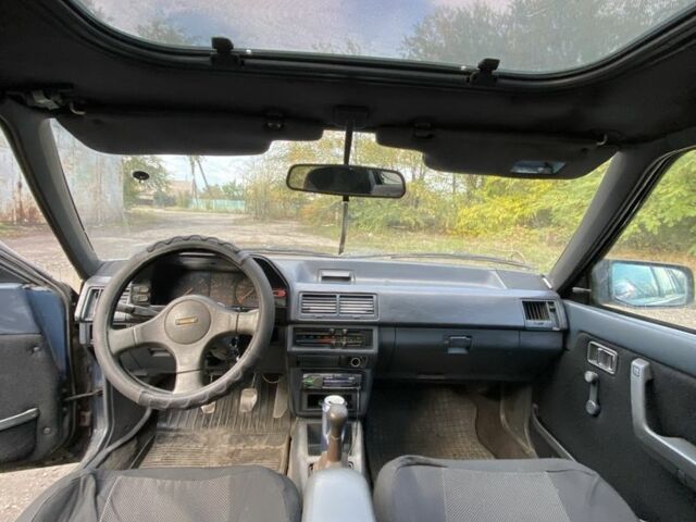 Синий Мазда 323, объемом двигателя 2 л и пробегом 465 тыс. км за 1000 $, фото 6 на Automoto.ua