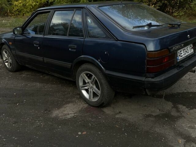 Синий Мазда 323, объемом двигателя 2 л и пробегом 465 тыс. км за 1000 $, фото 3 на Automoto.ua