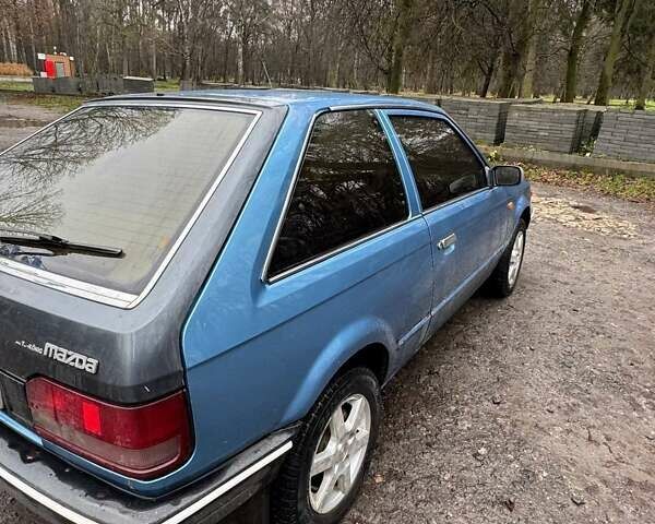 Синий Мазда 323, объемом двигателя 1.32 л и пробегом 220 тыс. км за 950 $, фото 10 на Automoto.ua