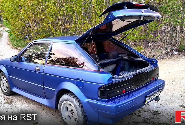 Синій Мазда 323, об'ємом двигуна 1.6 л та пробігом 111 тис. км за 650 $, фото 4 на Automoto.ua