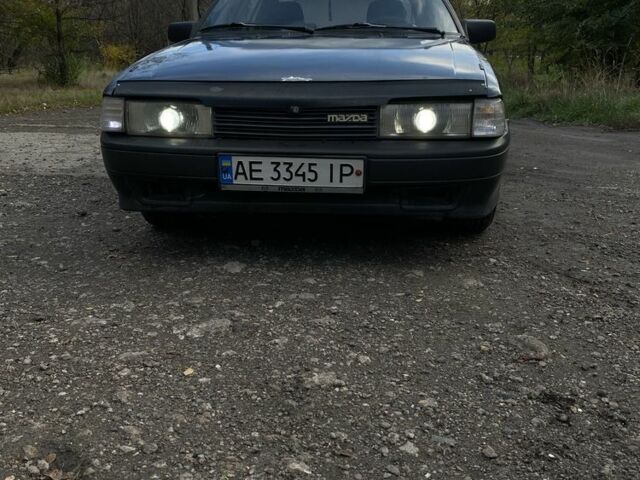 Синий Мазда 323, объемом двигателя 2 л и пробегом 465 тыс. км за 1000 $, фото 4 на Automoto.ua