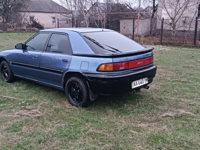 Синий Мазда 323, объемом двигателя 1.6 л и пробегом 260 тыс. км за 832 $, фото 2 на Automoto.ua