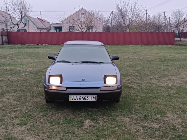 Синий Мазда 323, объемом двигателя 1.6 л и пробегом 260 тыс. км за 832 $, фото 3 на Automoto.ua