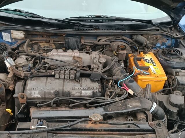 Синий Мазда 323, объемом двигателя 1.6 л и пробегом 260 тыс. км за 832 $, фото 7 на Automoto.ua