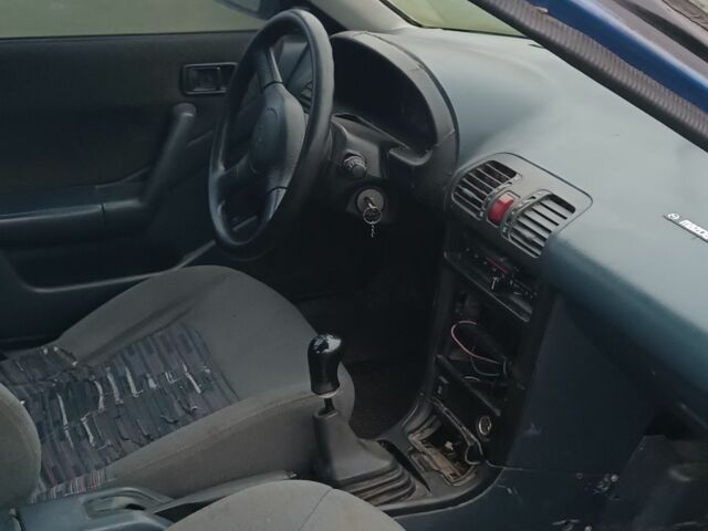 Синий Мазда 323, объемом двигателя 1.6 л и пробегом 260 тыс. км за 832 $, фото 6 на Automoto.ua