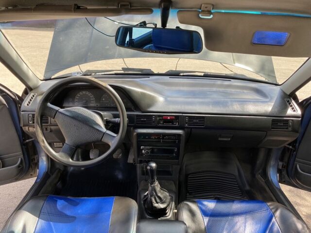 Синий Мазда 323, объемом двигателя 1.3 л и пробегом 600 тыс. км за 950 $, фото 3 на Automoto.ua