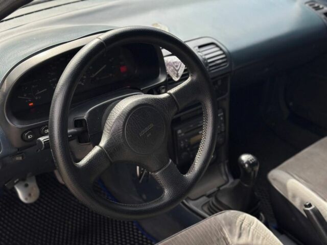 Синий Мазда 323, объемом двигателя 1.6 л и пробегом 250 тыс. км за 1204 $, фото 6 на Automoto.ua