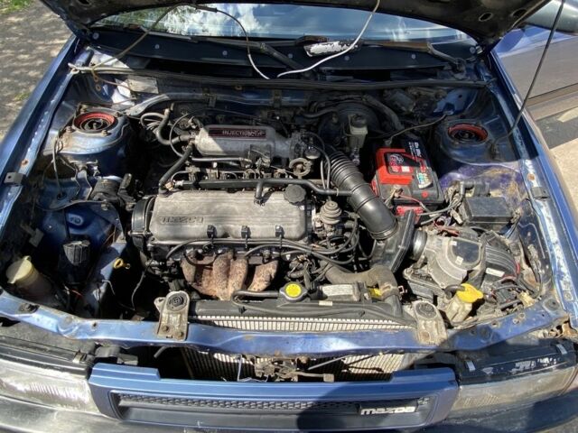 Синий Мазда 323, объемом двигателя 1.3 л и пробегом 600 тыс. км за 950 $, фото 2 на Automoto.ua
