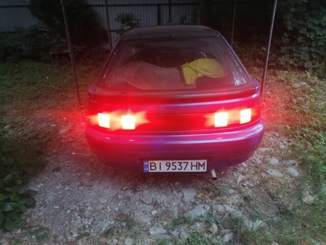 Синий Мазда 323, объемом двигателя 1.6 л и пробегом 10 тыс. км за 1426 $, фото 5 на Automoto.ua