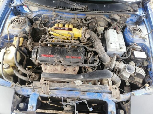 Синий Мазда 323, объемом двигателя 1.6 л и пробегом 10 тыс. км за 1426 $, фото 4 на Automoto.ua