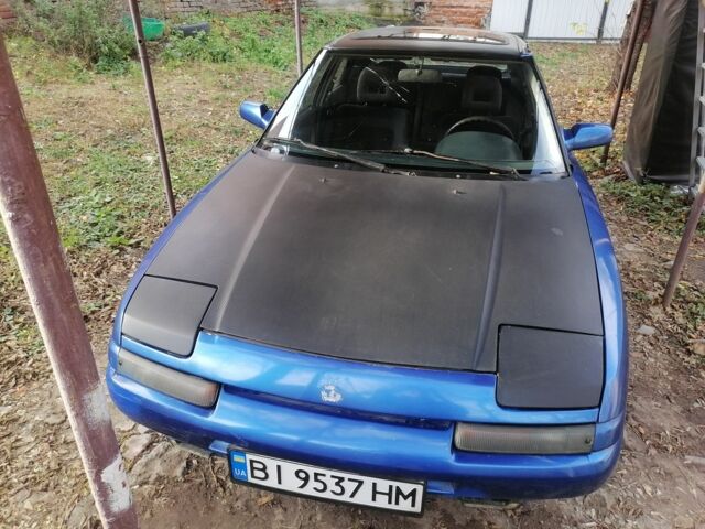 Синий Мазда 323, объемом двигателя 1.6 л и пробегом 10 тыс. км за 1426 $, фото 1 на Automoto.ua