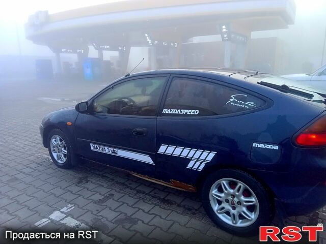 Синий Мазда 323, объемом двигателя 1.3 л и пробегом 230 тыс. км за 1350 $, фото 3 на Automoto.ua