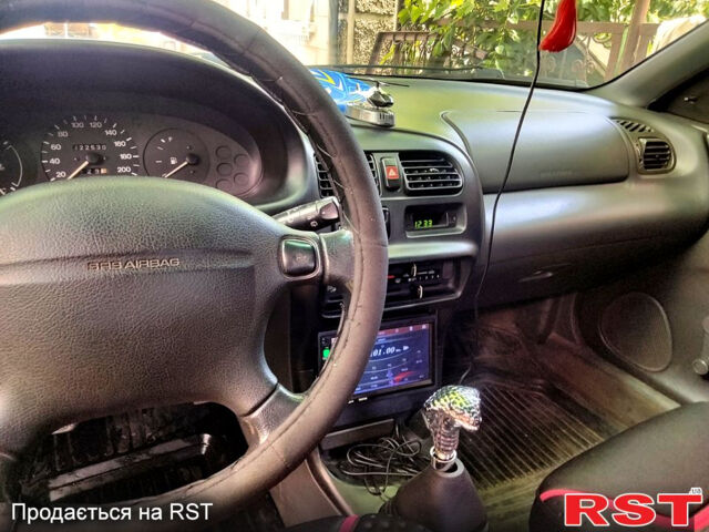 Синий Мазда 323, объемом двигателя 1.3 л и пробегом 120 тыс. км за 1500 $, фото 4 на Automoto.ua