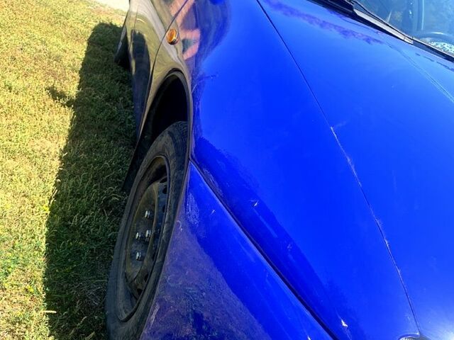 Синий Мазда 323, объемом двигателя 1.5 л и пробегом 340 тыс. км за 3000 $, фото 1 на Automoto.ua