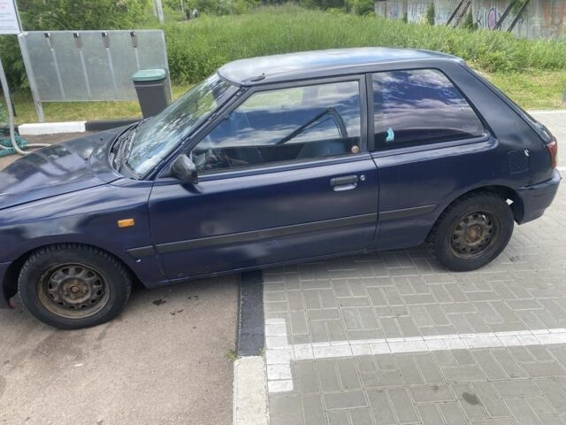 Синий Мазда 323, объемом двигателя 1.3 л и пробегом 260 тыс. км за 700 $, фото 9 на Automoto.ua