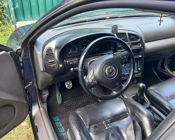 Синий Мазда 323, объемом двигателя 1.5 л и пробегом 350 тыс. км за 3300 $, фото 9 на Automoto.ua