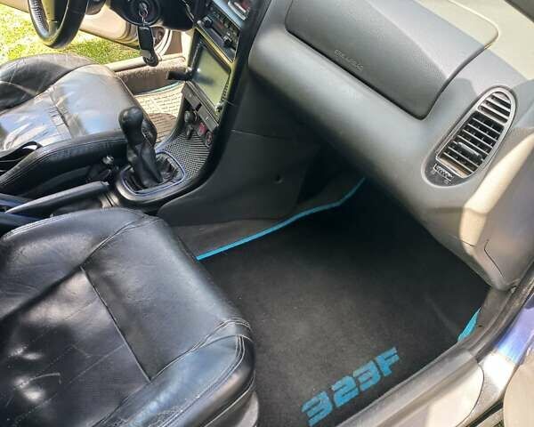 Синий Мазда 323, объемом двигателя 1.5 л и пробегом 350 тыс. км за 3300 $, фото 8 на Automoto.ua