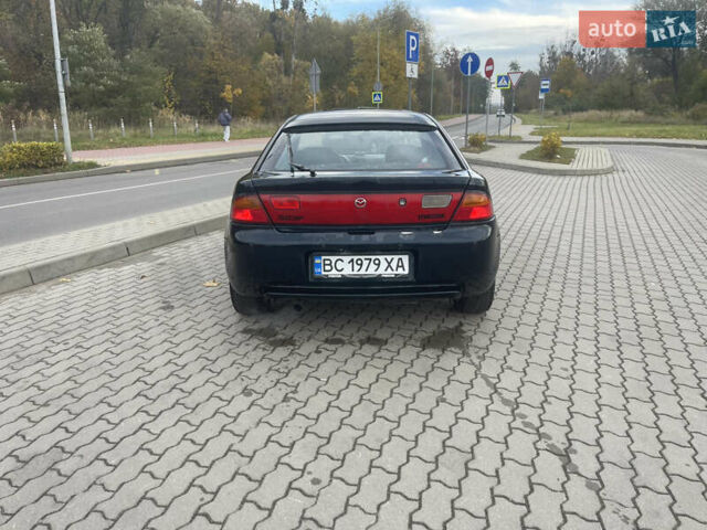 Синий Мазда 323, объемом двигателя 1.84 л и пробегом 227 тыс. км за 2899 $, фото 3 на Automoto.ua