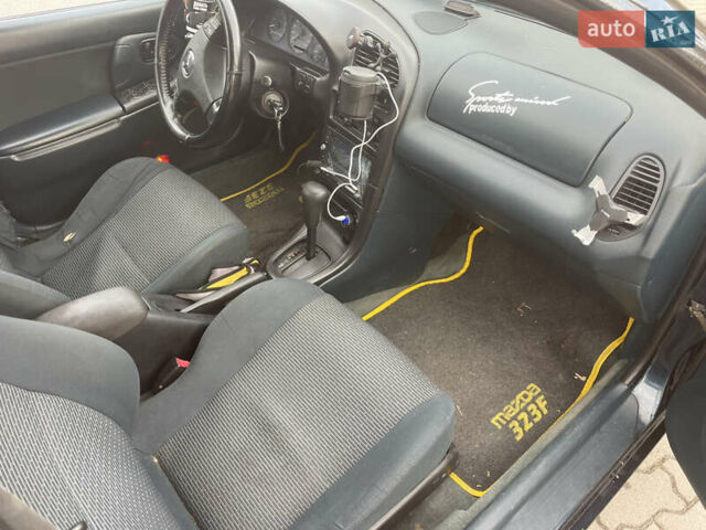 Синий Мазда 323, объемом двигателя 1.84 л и пробегом 227 тыс. км за 2899 $, фото 6 на Automoto.ua