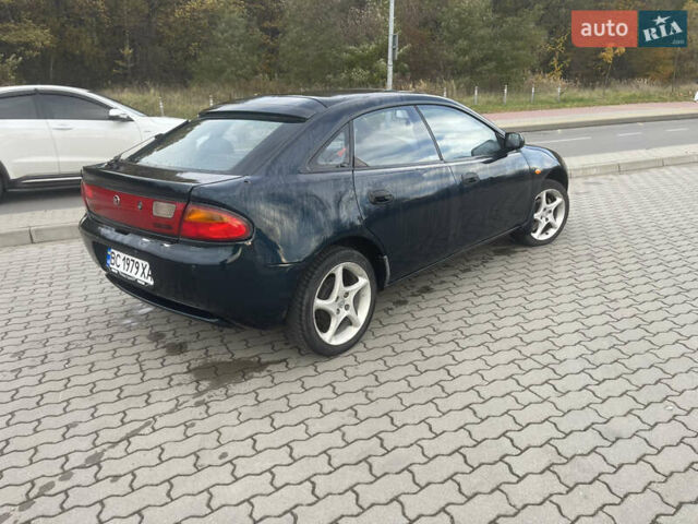 Синий Мазда 323, объемом двигателя 1.84 л и пробегом 227 тыс. км за 2899 $, фото 4 на Automoto.ua